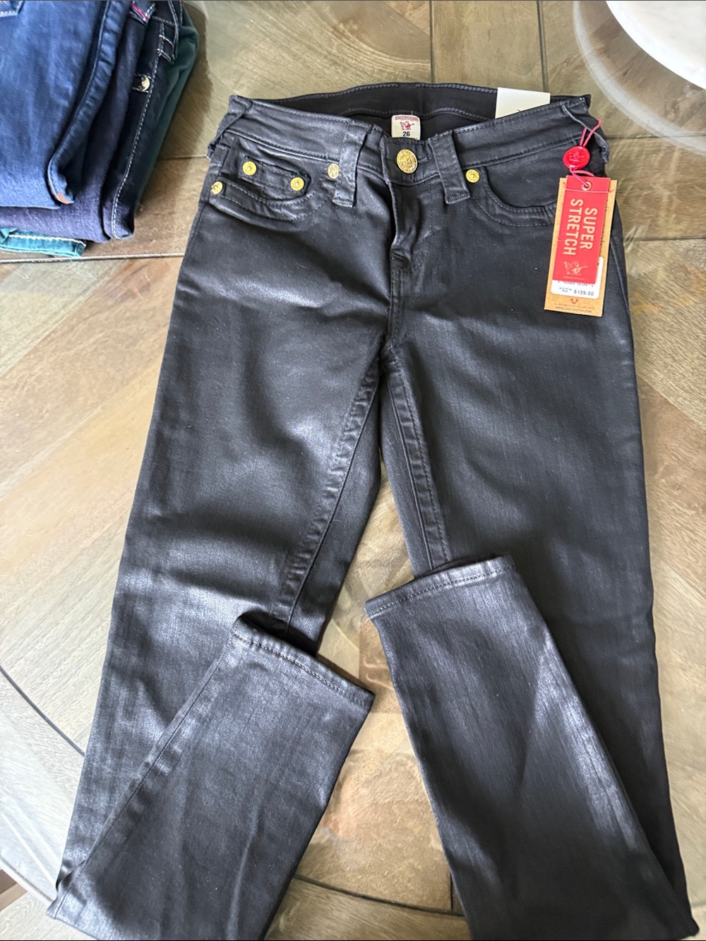 True Religion Black Coated Skinny Jeans with Gold Accents buttons